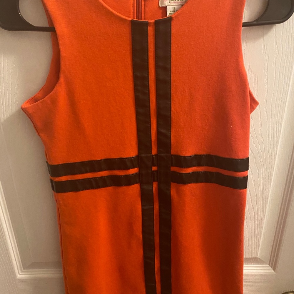 sleeveless orange dress with black stripes
